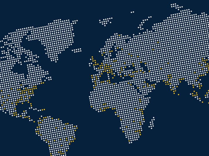 dotted world map with navy blue background and white and yellow dots