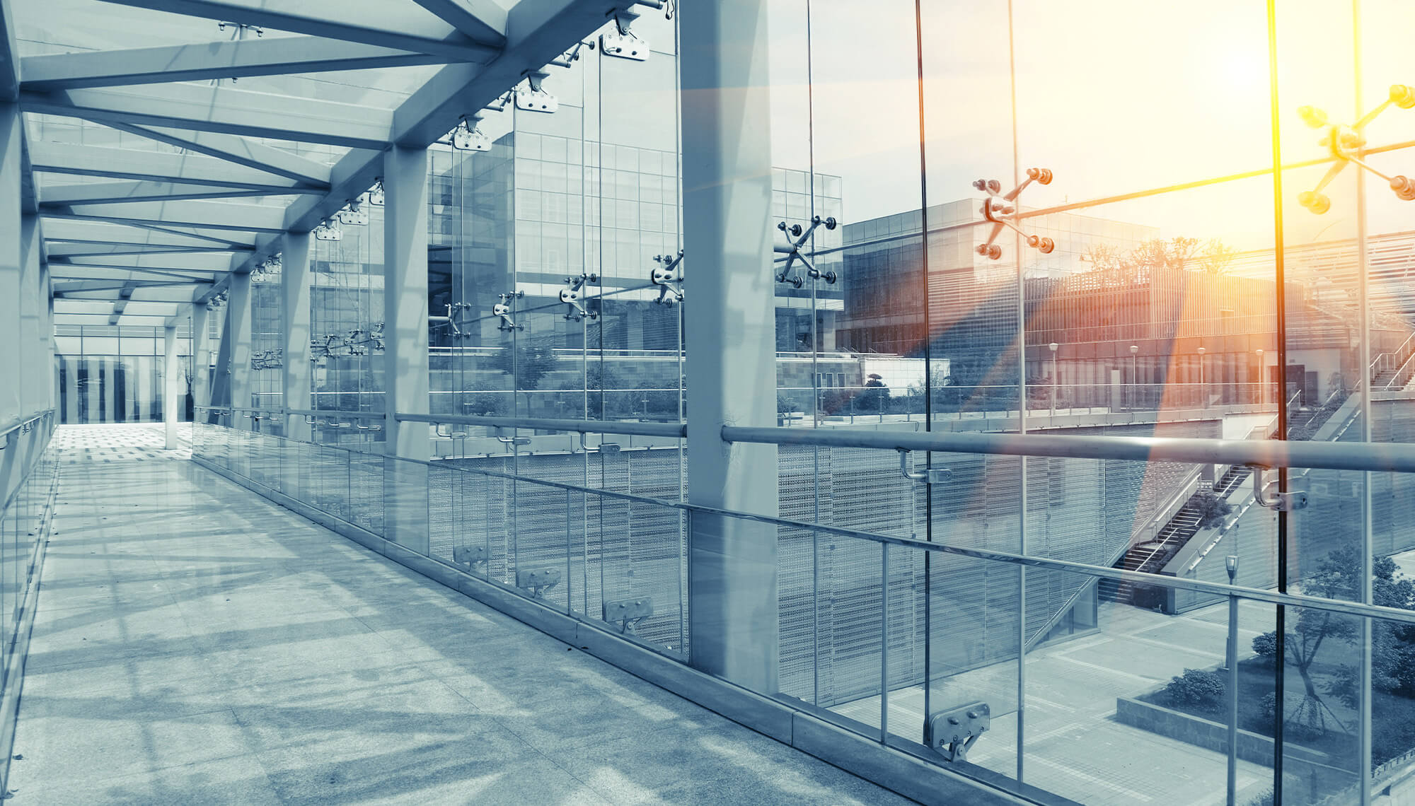Sun shining through a glass window in a newly constructed office building