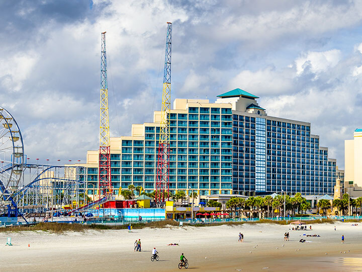 View down Daytona Beach in Florida with a carnival and oceanfront resorts