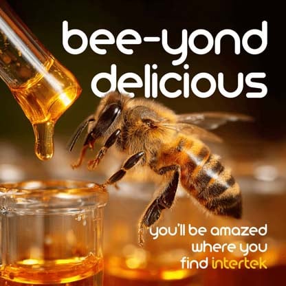 Bee hovering near glass jars of honey